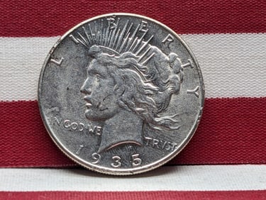 **AU+** 1935 Peace Silver Dollar