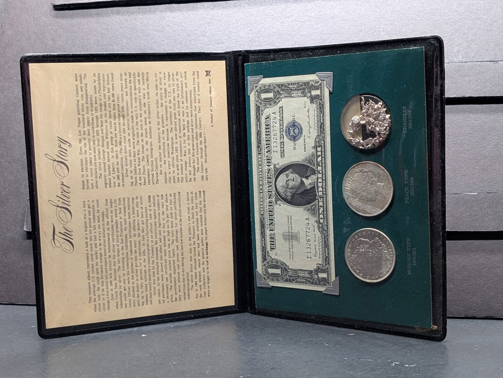 The Silver Story With 1957 A Silver Certificate $1, 1921 Morgan Dollar, & 1923 Peace Dollar In: The Silver Story With 1957 A Silver Certificate $1, 1921 Morgan Dollar, & 1923 Peace Dollar In Folder, $100 Confederate Note, Five Shilling Note