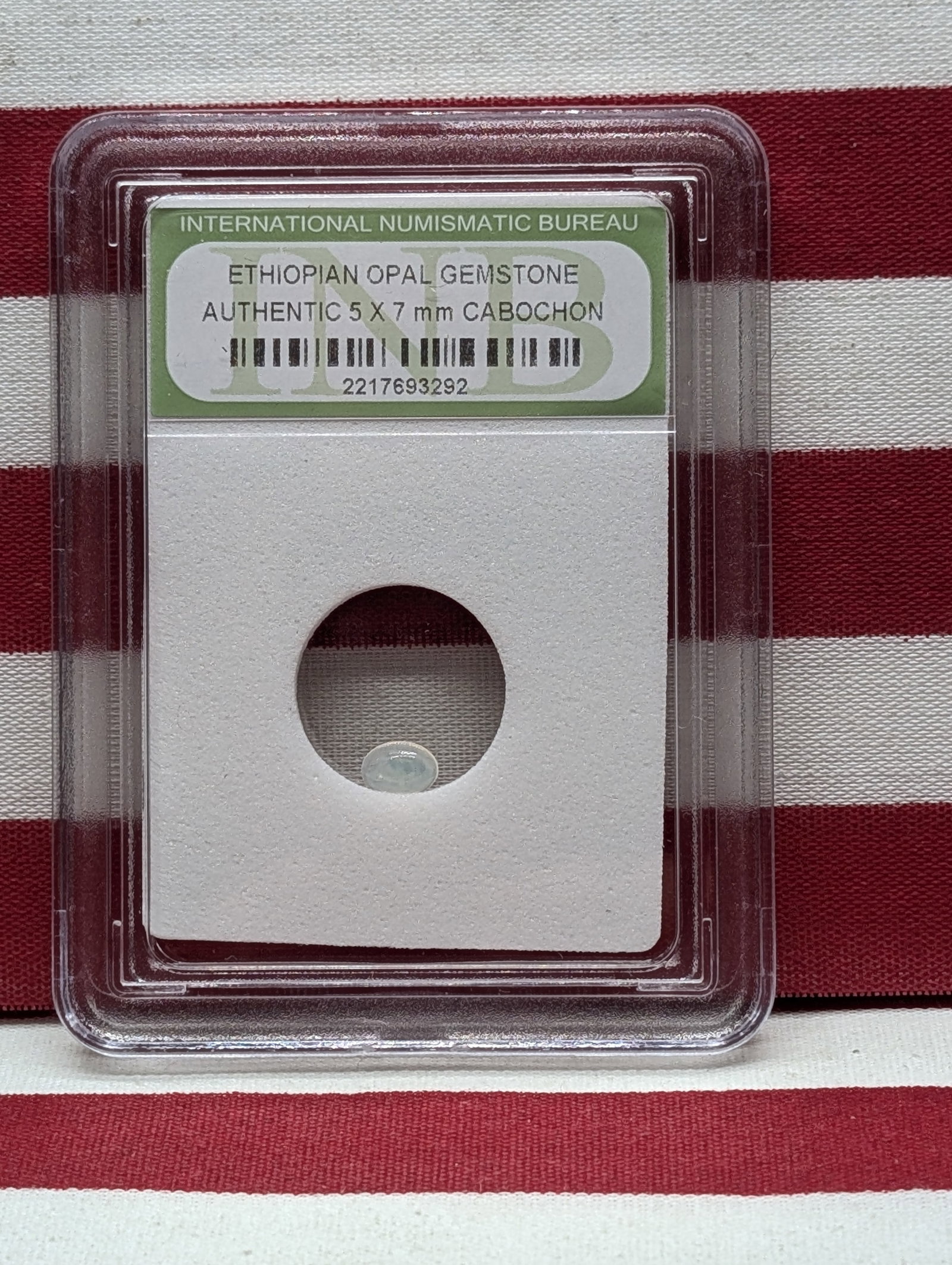 Authentic Gemstone!! 5x7mm Cabochon Ethiopian Opal!! - Slabbed by International Numismatic Bureau: Authentic Gemstone!! 5x7mm Cabochon Ethiopian Opal!! - Slabbed by International Numismatic Bureau