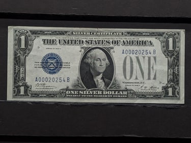1928-A Bright Crisp $1 "Funnyback" Blue Seal Silver Certificate. Bust Of George Washington. Low