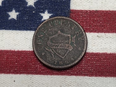 1864 Merchant Civil War Token. OBV: "One Country". REV: "W. K. Lanphear, Seal Presses, Cin. O."
