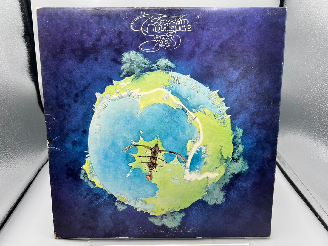 1975 Yes Fragile Repress Vinyl Album - SD 7211: 1975 Yes Fragile Repress Vinyl Album - SD 7211 - Records have not been tested by the auction house for play quality. All items are sold as is.
