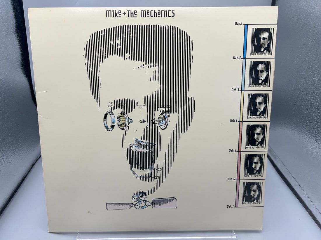 1985 Mike + The Mechanics Self Titled Vinyl Album - 81287-1: 1985 Mike + The Mechanics Self Titled Vinyl Album - 81287-1 - Records have not been tested by the auction house for play quality. All items are sold as is.