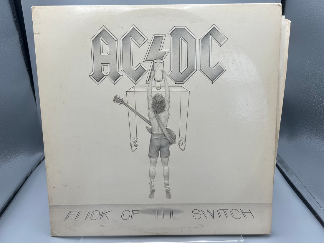 1983 AC/DC Flick of The Switch Club Edition Vinyl Album - A1 80100: 1983 AC/DC Flick of The Switch Club Edition Vinyl Album - A1 80100 - Records have not been tested by the auction house for play quality. All items are sold as is.