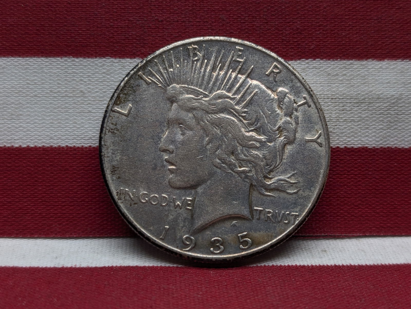 1935 Semi-Key Date Peace Silver Dollar. (1 of 2)