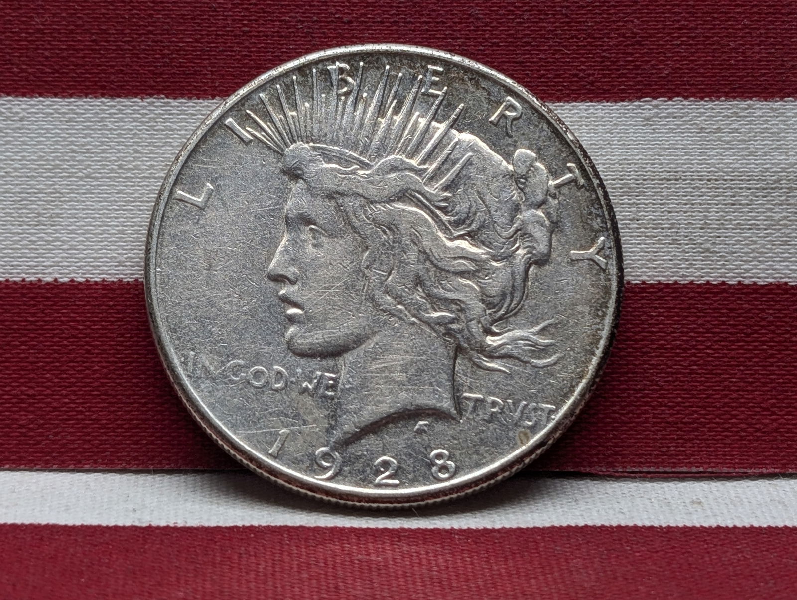 1928-S Semi-Key Date Peace Silver Dollar. (1 of 2)