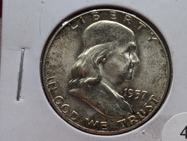 1957 Franklin 50c. 90% Silver. GEM BU