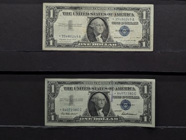 1957, 1957-A $1 Blue Seal STAR Note Silver Certificates.  Bust of George Washington.  2 Notes.