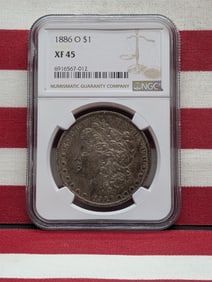1886-O Morgan $1. Slabbed by NGC, top tier grader, as XF 45. Very nice coin.