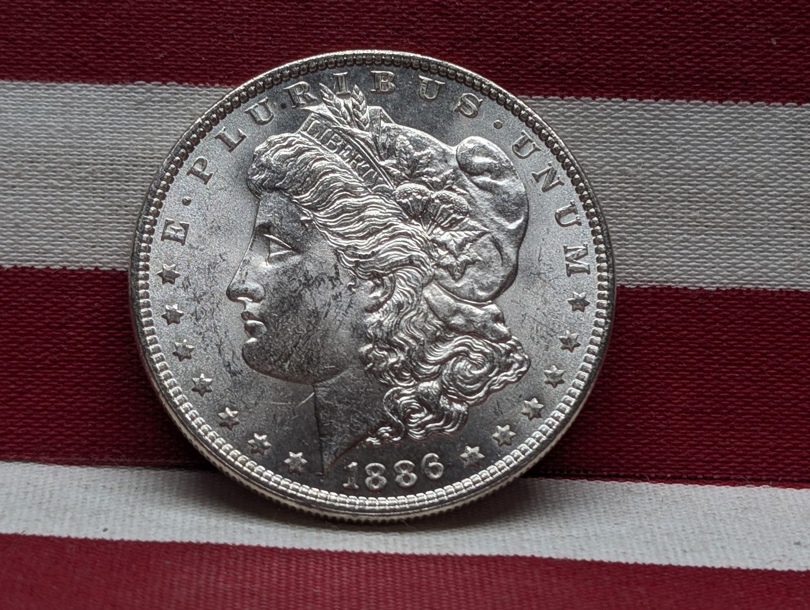 **GEM BU** 1886 Morgan Silver Dollar (1 of 2)