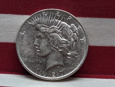 1927-D Peace Silver Dollar