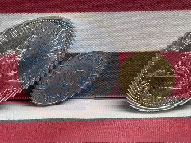 1954 Saarland 10 Franken & 1975 Canada Silver Calgary Dollar (2 PCS)
