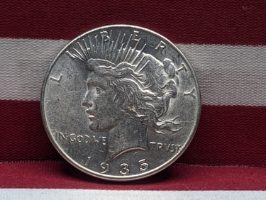 **BETTER DATE - AU58** 1935-P Peace Silver Dollar