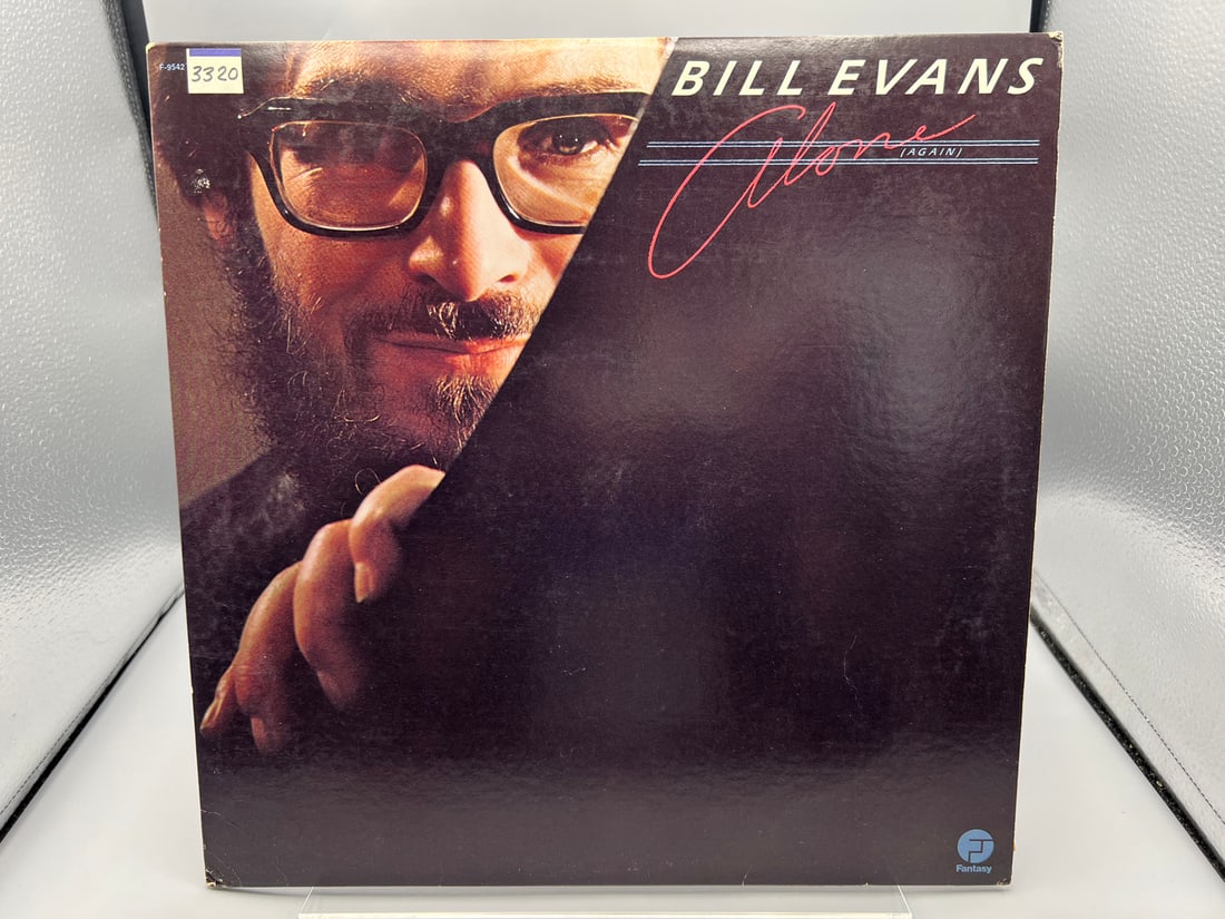 Bill Evans: Alone Again (1977), promo stamp on back cover: Bill Evans: Alone Again (1977), promo stamp on back cover - Records have not been tested by the auction house for play quality. All items are sold as is.