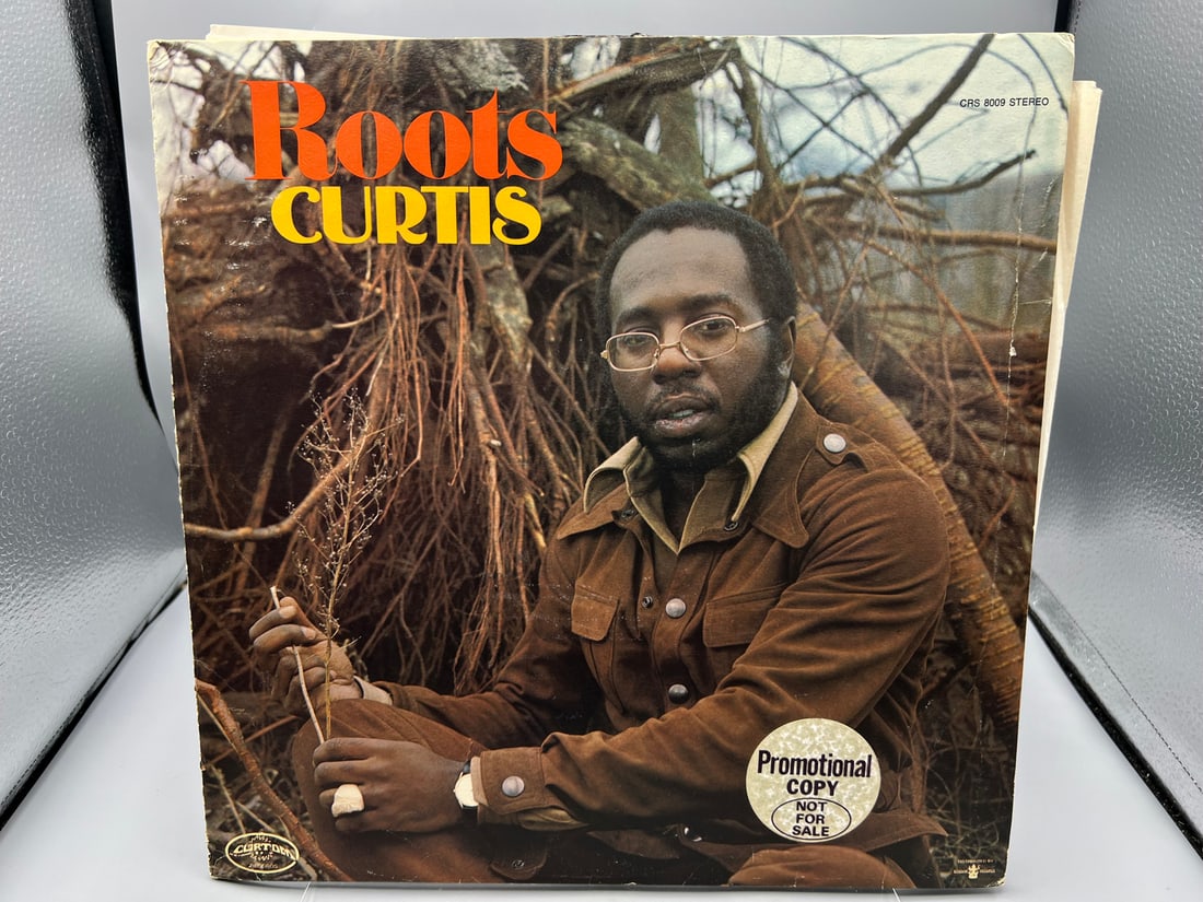 1971 Curtis Mayfield Roots Vinyl Album W/ Promo Sticker & Calender - CRS 8009: 1971 Curtis Mayfield Roots Vinyl Album W/ Promo Sticker & Calender - CRS 8009 - Records have not been tested by auction house for play quality. All items are sold as is.