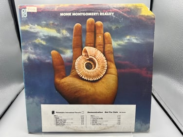 Monk Montgomery: Reality (1974), white label promo, promo sticker and corner notch on cover (Jazz