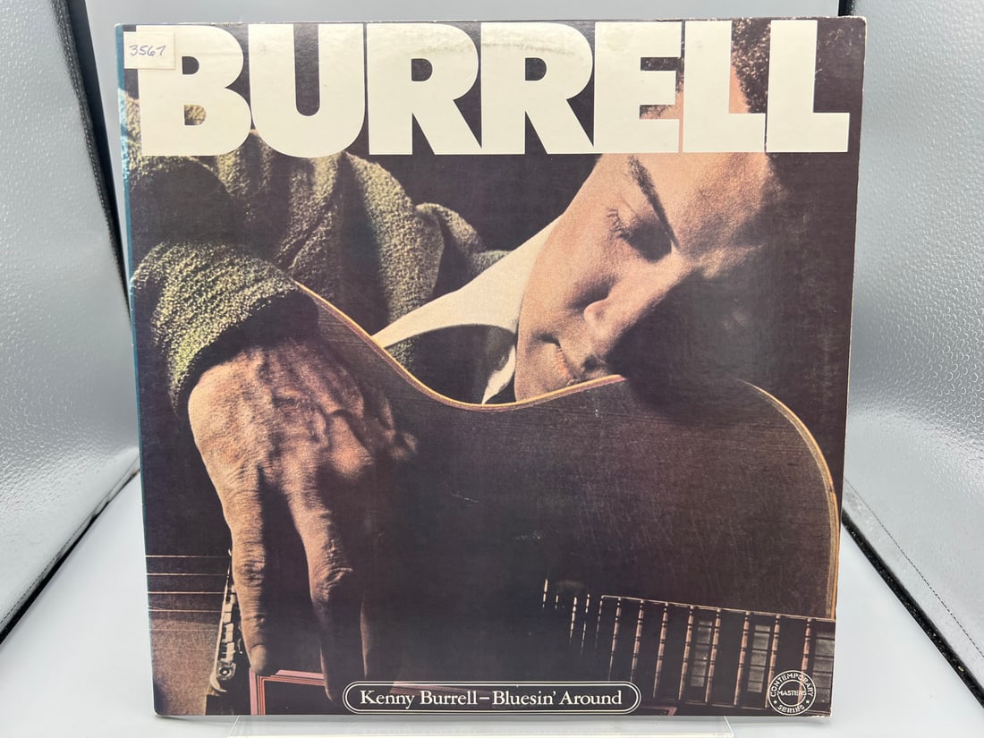 Kenny Burrell: Bluesin' Around (1983), promo stamp on back cover: Kenny Burrell: Bluesin' Around (1983), promo stamp on back cover - Records have not been tested by the auction house for play quality. All items are sold as is.