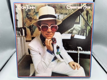 Elton John: Greatest Hits (1974), includes 1-page insert