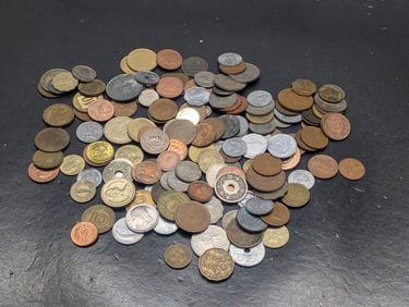 16 Ounces Unsearched Foreign Coins.