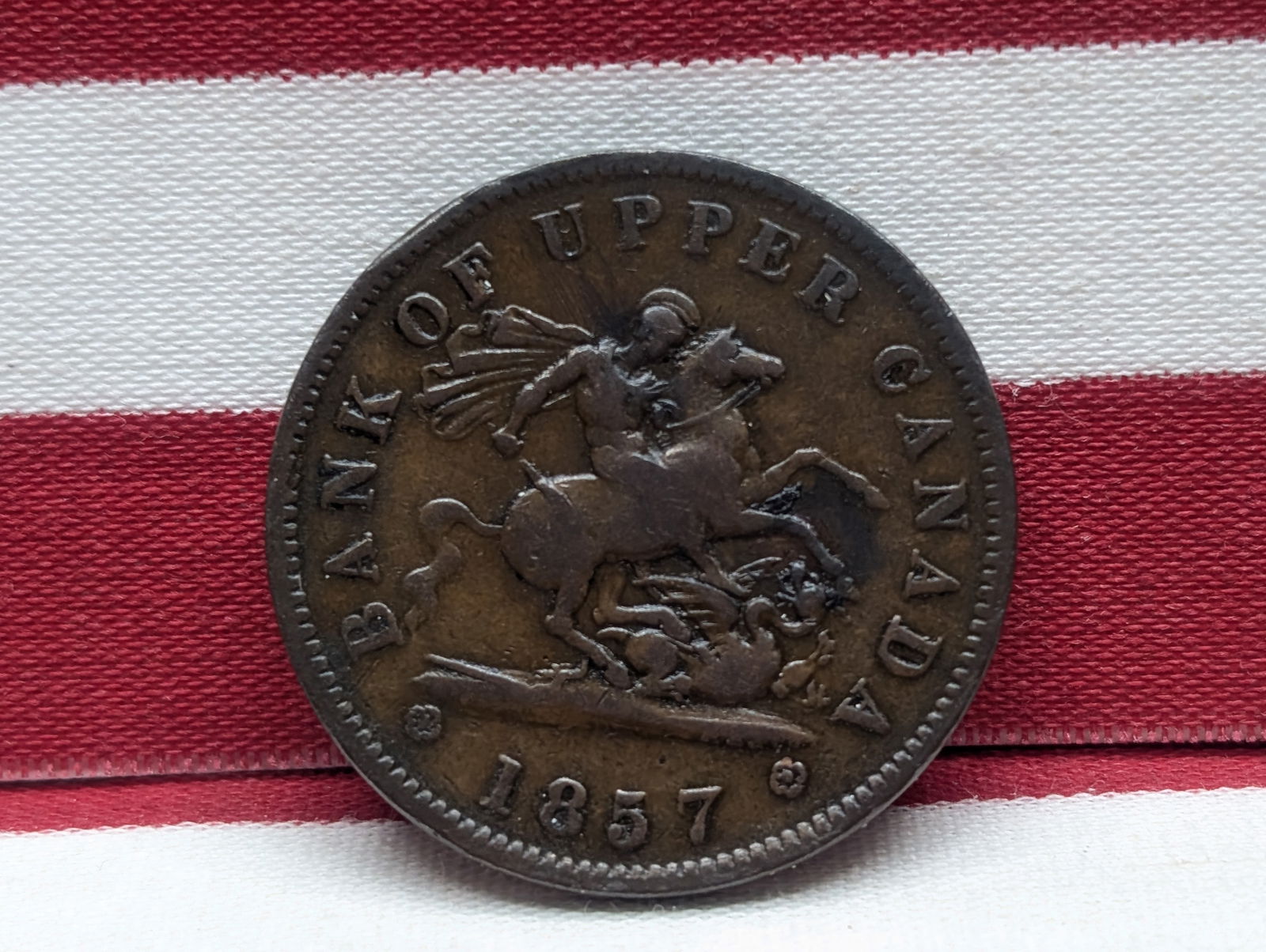 1857 Bank of Upper Canada One Cent token. Attractive VF. (1 of 3)