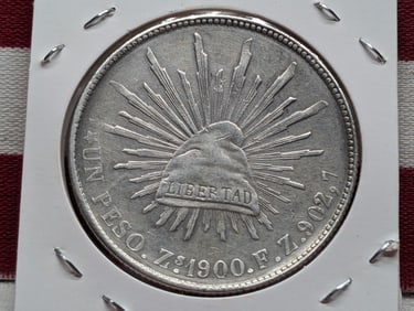 1900-Z  1 Peso, 90.27 % Silver, Mexico Libertad Cap & Rays