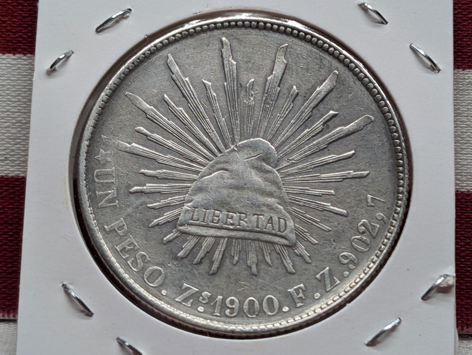 1900-Z  1 Peso, 90.27 % Silver, Mexico Libertad Cap & Rays (1 of 3)