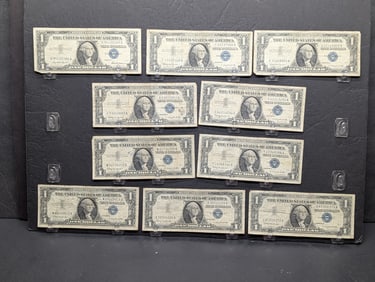 (9) 1957-B One Dollar Silver Certificates and (1) 1957 One Dollar Silver Certificate