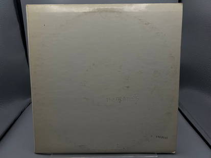 1968 The Beatles White Album Repress Vinyl Album - SWBO-101: 1968 The Beatles White Album Repress Vinyl Album - SWBO-101 - Records have not been tested by auction house for play quality. All items sold as is.