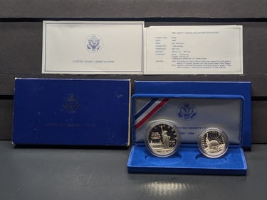 1986-S Liberty Silver Dollar & 1986-S Liberty Clad Half Dollar in OGP w/ COA