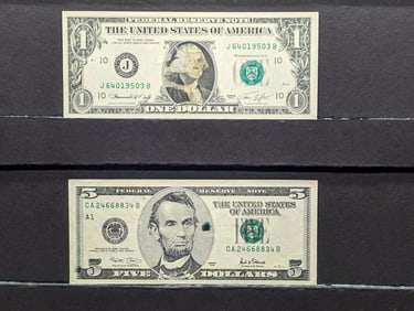 2 Error Currency Notes Series 2001 $5 In the border and beside Lincoln's face & series 1974 Dollar