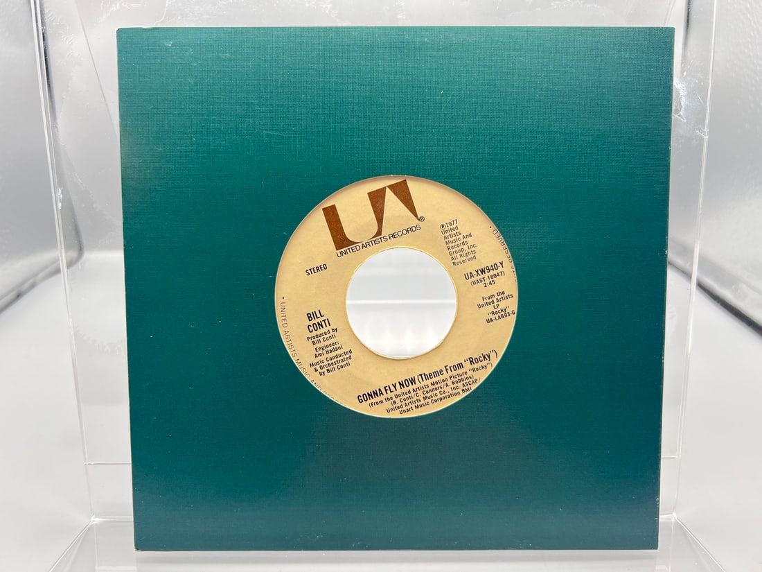 1976 Bill Conti Gonna Fly Now (Theme From "Rocky")/Reflections 45 RPM Record - UA-XW940-Y: 1976 Bill Conti Gonna Fly Now (Theme From "Rocky")/Reflections 45 RPM Record - UA-XW940-Y - Records are untested by auction house for play quality. All items are sold as is.