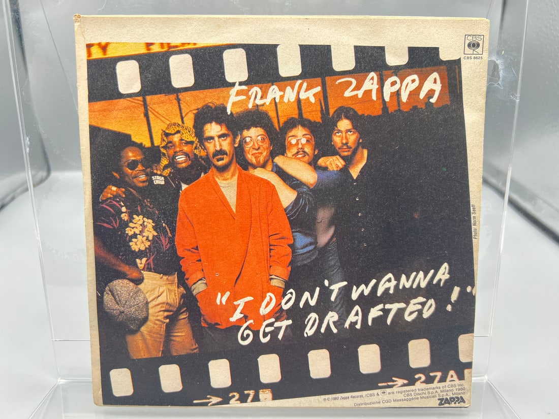 1980 Frank Zappa Ancient Armaments/I Don't Wanna Get Drafted Italy Release 45 RPM Record W/ Picture: 1980 Frank Zappa Ancient Armaments/I Don't Wanna Get Drafted Italy Release 45 RPM Record W/ Picture Sleeve - CBS 8625 - Records are untested by auction house for play quality. All items are sold as is