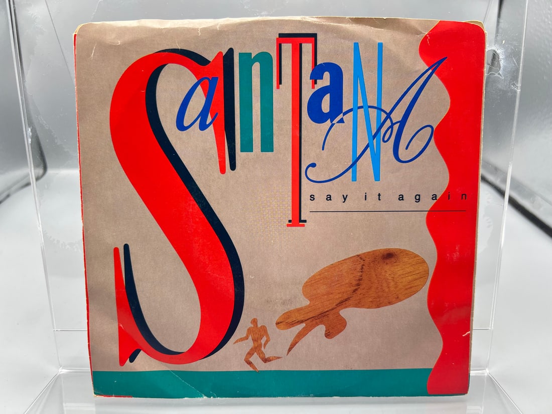 1985 Santana Say It Again/Touchdown Raiders 45 RPM Record W/ Picture Sleeve - 38-04758: 1985 Santana Say It Again/Touchdown Raiders 45 RPM Record W/ Picture Sleeve - 38-04758 - Records are untested by auction house for play quality. All items are sold as is.