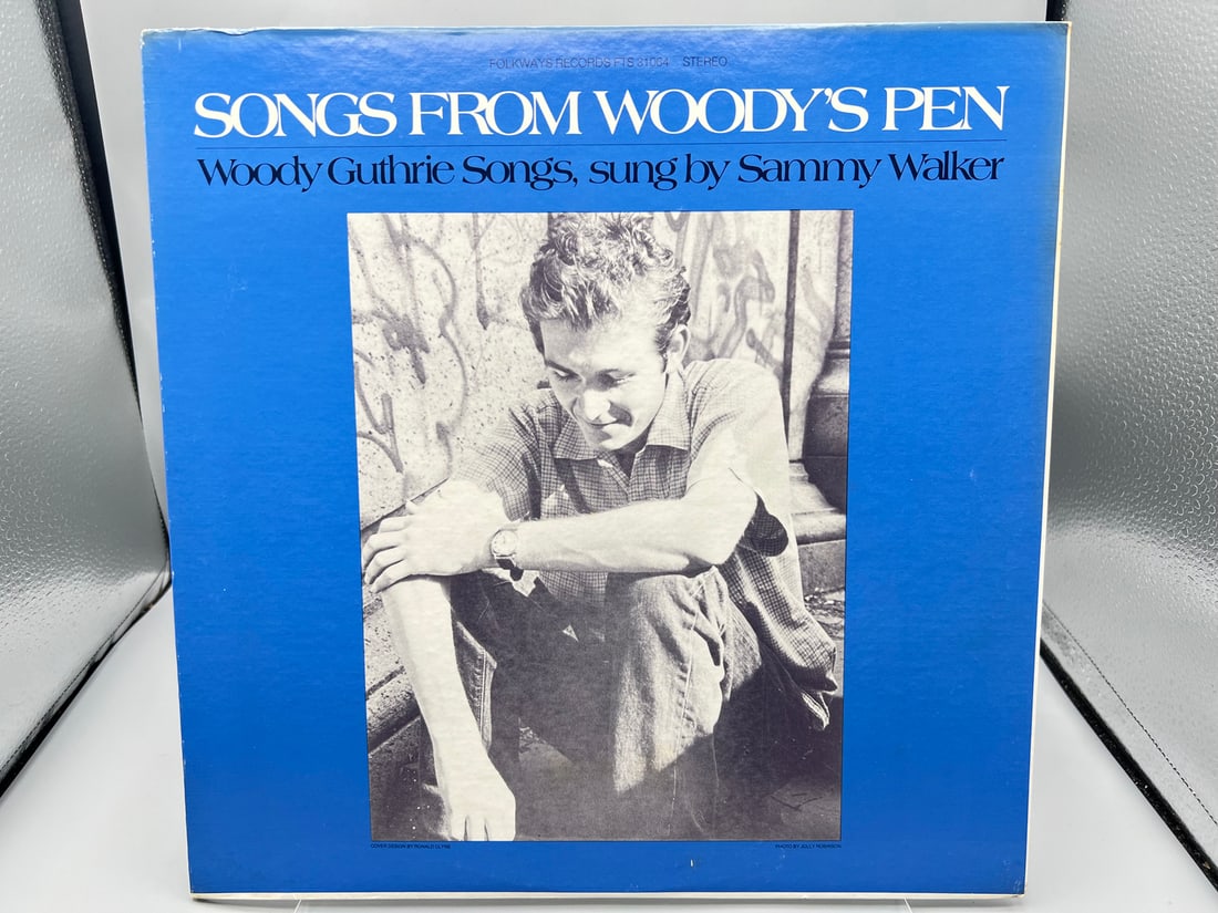 1979 Sammy Walker Songs From Woody's Pen Vinyl Album - FTS 31064: 1979 Sammy Walker Songs From Woody's Pen Vinyl Album - FTS 31064 - Records are untested by auction house for play quality. All items are sold as is.