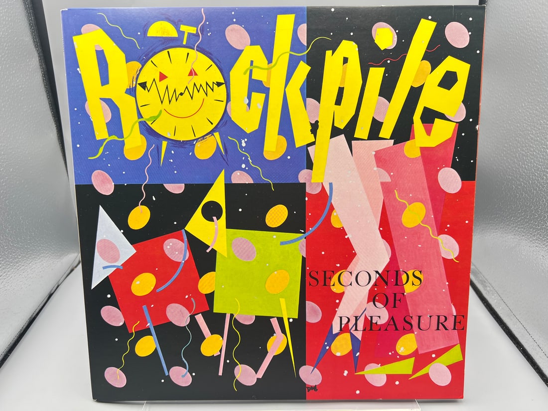 1980 Rockpile Seconds of Pleasure Vinyl Album W/ 45 RPM Promo Record - JC 36886: 1980 Rockpile Seconds of Pleasure Vinyl Album W/ 45 RPM Promo Record - JC 36886 - Records are untested by auction house for play quality. All items are sold as is.