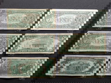 U.S. Currency Lot. 1928-D $2, 1976 $2, 1934-D $5, 1957 A&B $1 Silver Certificates, 1995 Santa Note