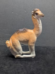 Soviet Porcelain Figurine – Kneeling Camel, Lomonosov Factory (USSR, ca. 1950s–1980s)