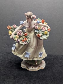 Capodimonte porcelain figurine #4047, young lady with baskets of pastel flowers, hand-painted, 7.5"