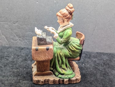 George Z. Lefton porcelain figurine, lady in green dress seated at desk with typewriter,