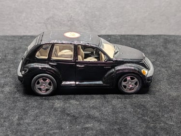 Saico 2000 PT Cruiser Metal Collector Car