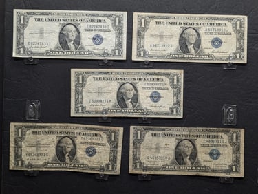 (3) 1935E, (1) 35F, (1) 35G One Dollar Silver Certificates