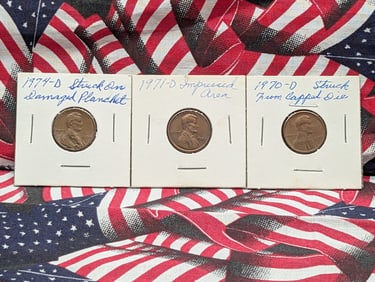 (3) Lincoln Memorial Cents 1974-D Struck on Damaged Planchet, 1971-D Impressed Area, 1970-D Struck