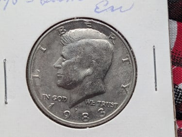 1983-P Kennedy Half Dollar Laminated Ear