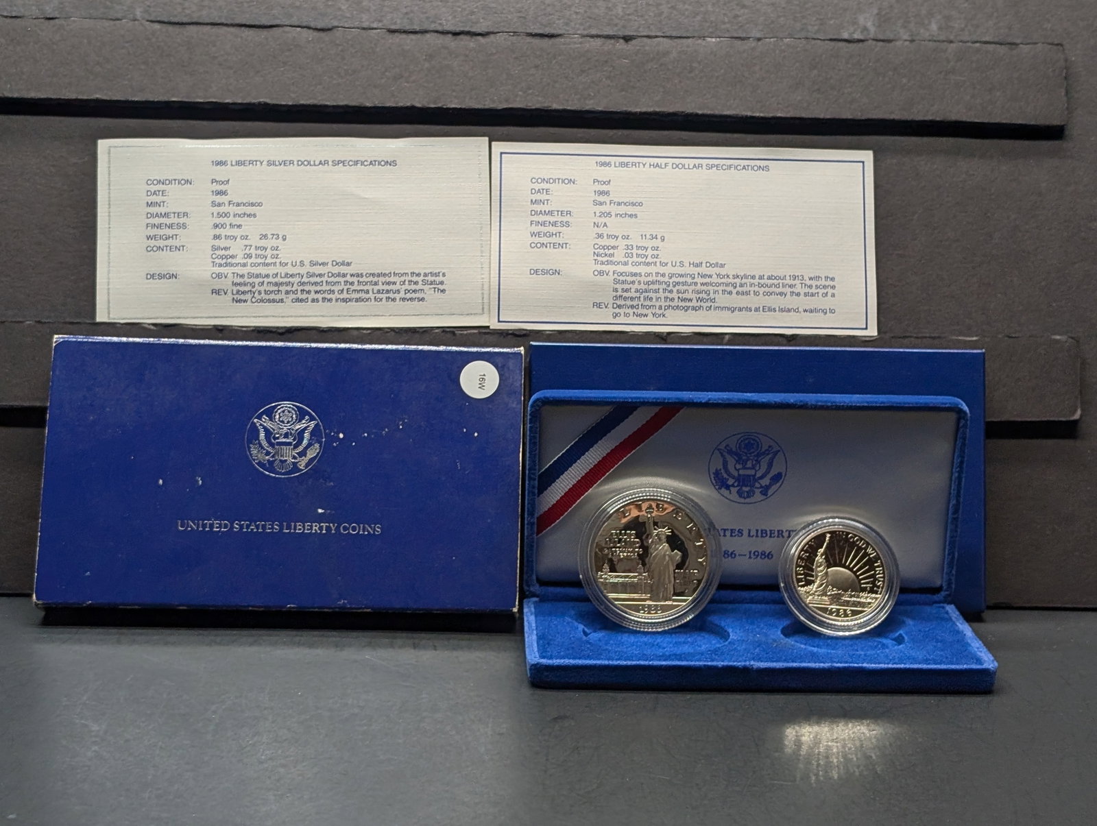 1986-S Liberty 90% Silver Dollar & Clad Half Dollar In OGP With COA: 1986-S Liberty 90% Silver Dollar & Clad Half Dollar In OGP With COA
