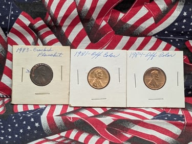 (3) Lincoln Memorial Cents 1983 Cracked Planchet ,1984 Off Color, 1981 Off Color