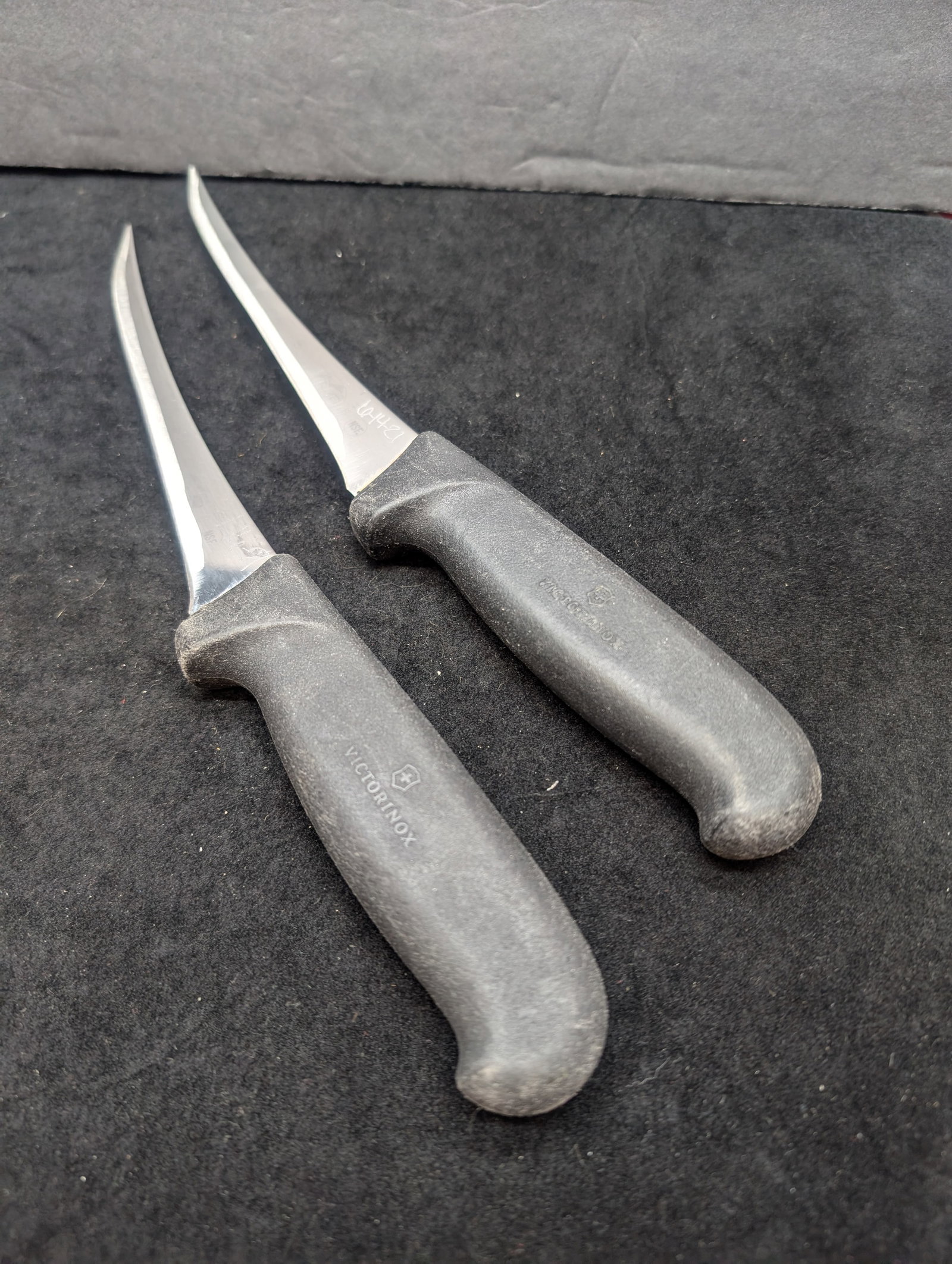 Two -Victorinox Fibrox Butchering Knives I-Forschner 6603.15 Stainless, Made In Switzerland.: Two -Victorinox Fibrox Butchering Knives I-Forschner 6603.15 Stainless, Made In Switzerland. Well-used & sharpened but good filleting Knives