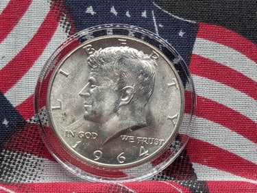 1964 Kennedy Silver Half Dollar in Capsule.