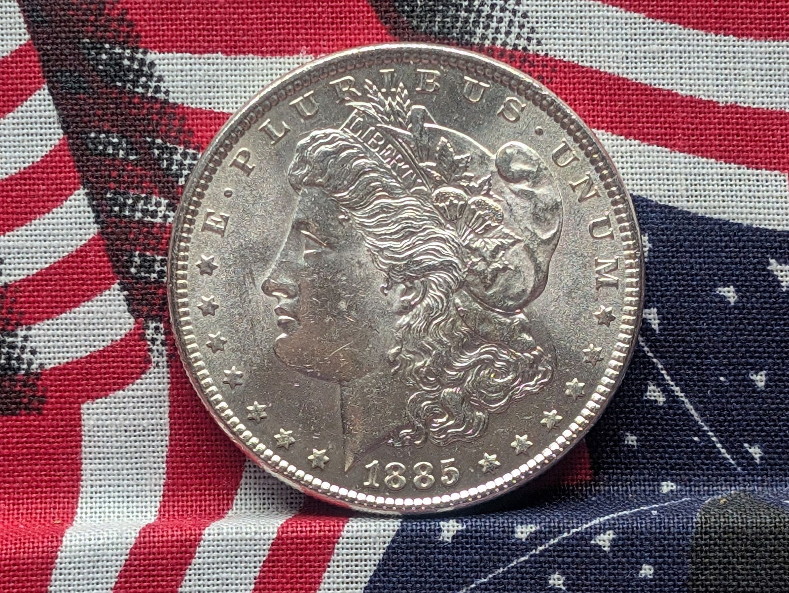 1885 Morgan Silver Dollar *GEM BU*. (1 of 2)