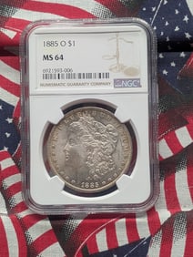 1885-O Morgan Dollar. Slabbed by NGC as MS 64. White.