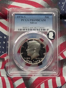 1976-S 40 percent Kennedy Half. Slabbed by PCGS, top grader, as Proof 69 Deep Cameo. Stickered for